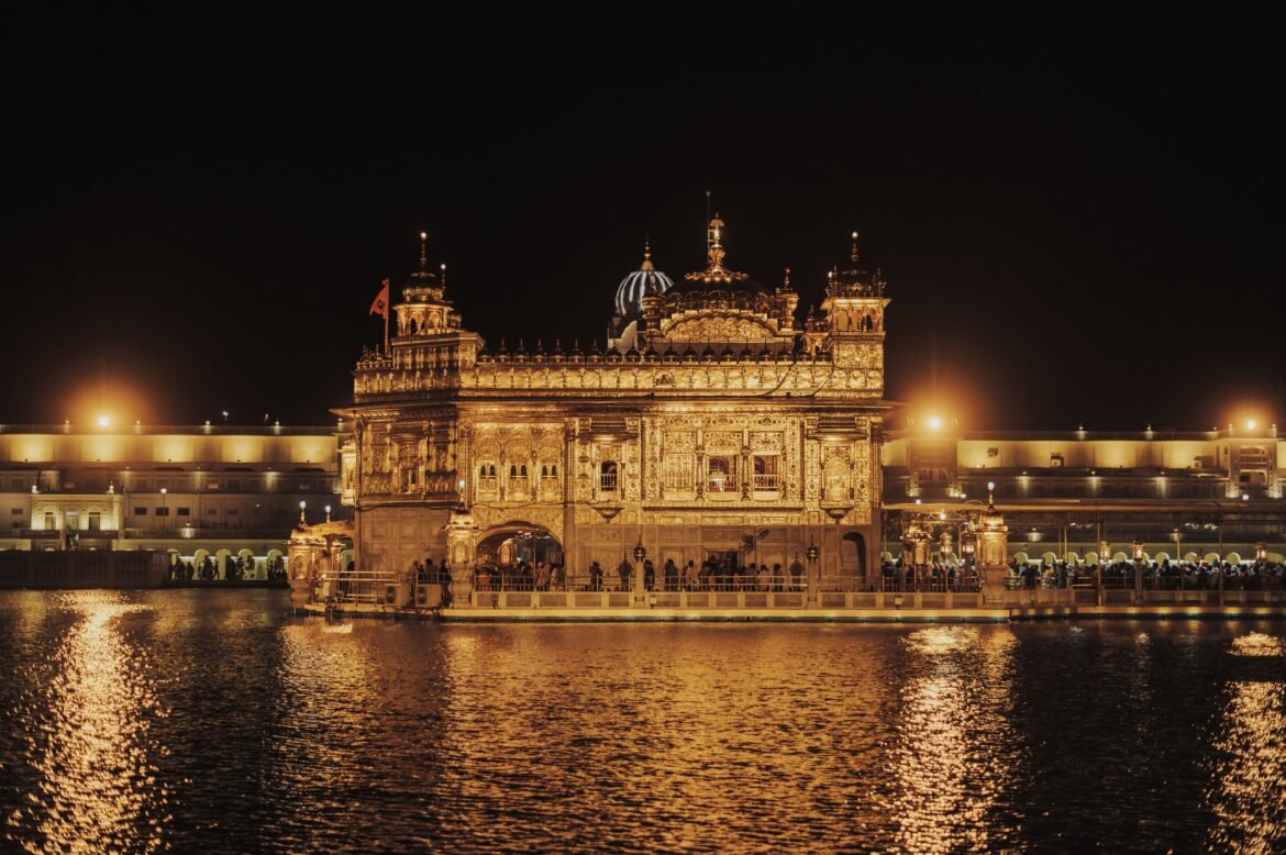 Golden Temple Amritsar reflecting on Amrit Sarovar sacred pool